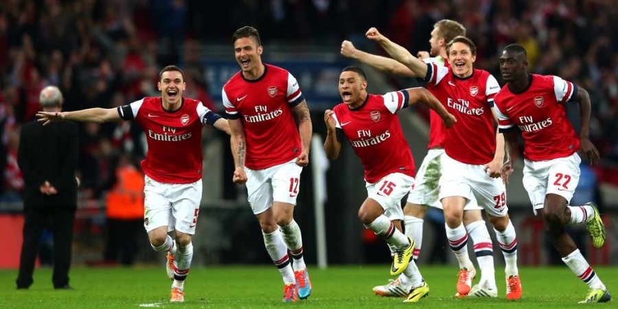 Arsenal players celebrating their overpowering game